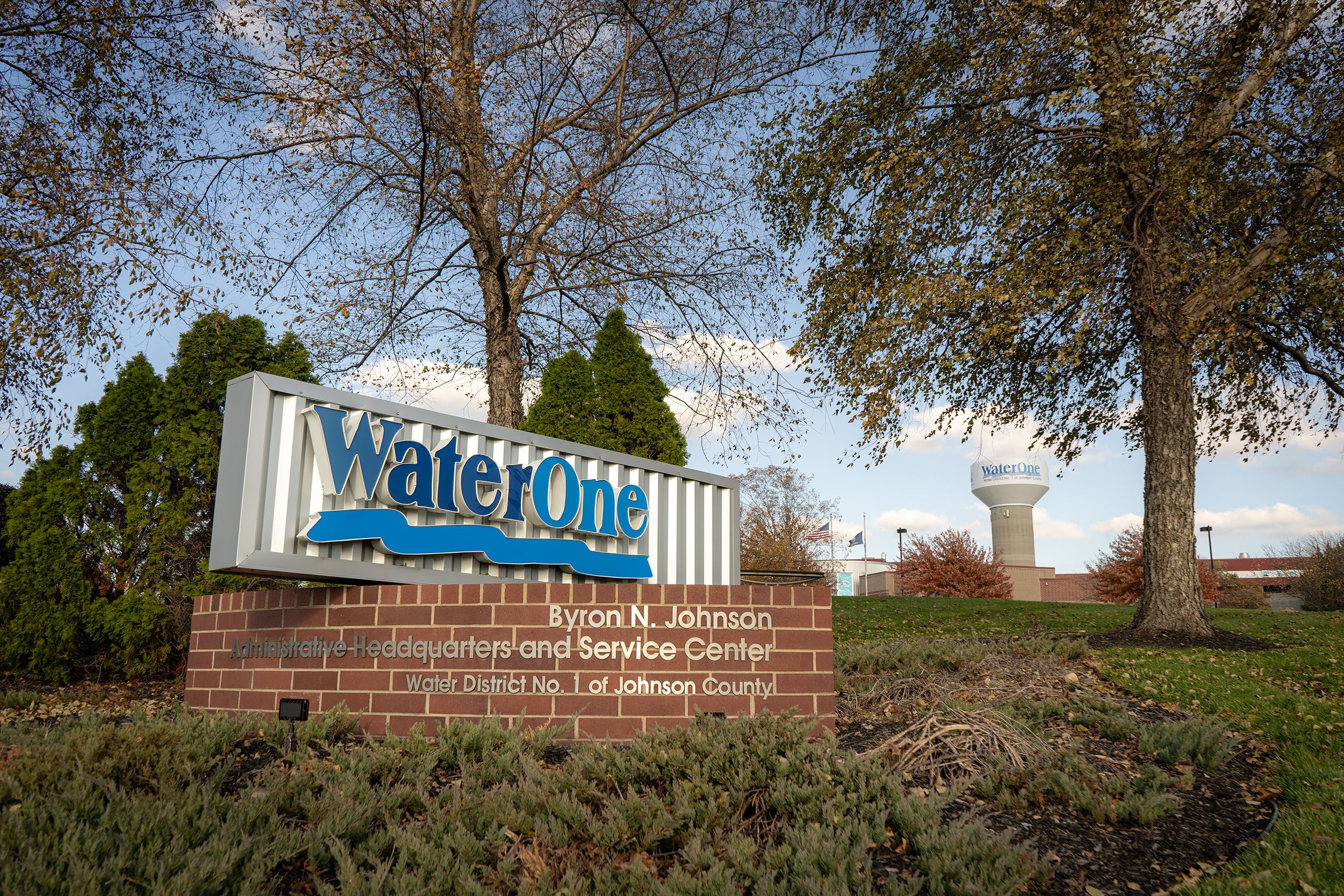 Large outdoor sign that showcases WaterOne logo and address.